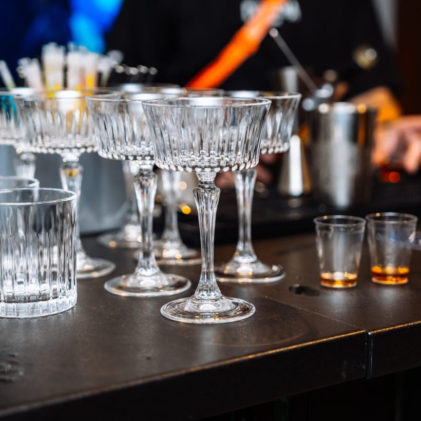 Guests savor cocktails while learning the art of mixology together.